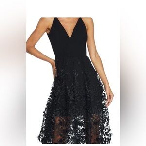 Dress the population little black dress